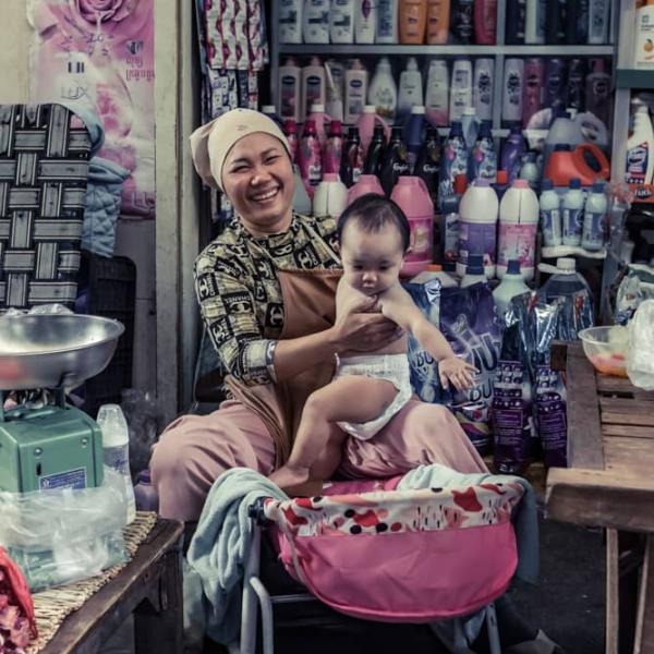 Mom and baby in her shop